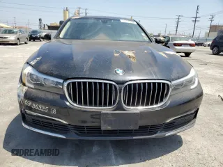 2018 BMW 7 Series 740i xDrive with VIN WBA7E4C57JGV23763, listed as a Copart auction lot 67151864 with 173,803 mi miles and Clean Title. Bid and sale history available at carsss.com. Image 5.