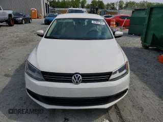 2011 Volkswagen Jetta SE with VIN 3VWDZ7AJ6BM381325, listed as a Copart auction lot 52987185 with 151,208 mi miles and Salvage title. Bid and sale history available at DreamBid. Image 5.