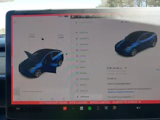 2021 Tesla Model Y Long Range with VIN 5YJYGDEE4MF119249, listed as a IAAI auction lot 41764711 with 87,796 mi miles. Bid and sale history available at carsss.com. Image 7.