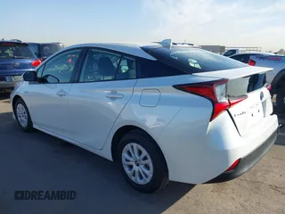 2021 Toyota Prius L Eco with VIN JTDKAMFU7M3133544, listed as a IAAI auction lot 41548653 with 115,214 mi miles and . Bid and sale history available at DreamBid. Image 3.