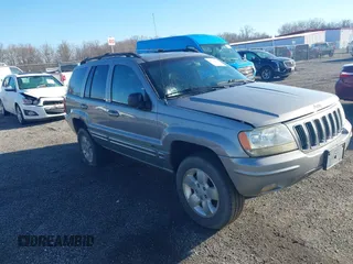 2001 Jeep Grand Cherokee Limited with VIN 1J4GW58N11C650606, listed as a IAAI auction lot 41722256 with 1 mi miles. Bid and sale history available at carsss.com. Image 1.