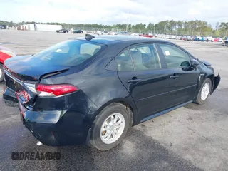 2021 Toyota Corolla Hybrid LE with VIN JTDEAMDE3MJ025426, listed as a IAAI auction lot 41922582 with 57,705 mi miles. Bid and sale history available at carsss.com. Image 4.