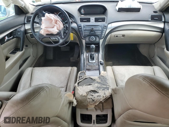 2012 Acura TL Auto z VIN 19UUA8F20CA028516, wystawiony jako Copart lot #52215635 z przebiegiem 163 418 mil mil oraz Nie do naprawy • Non repairable. Historia ofert i sprzedaży dostępna na DreamBid. Obrazek 8.