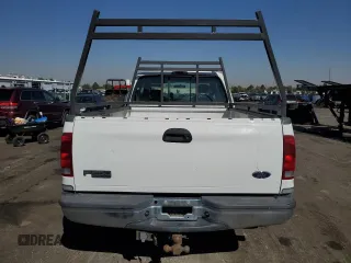 2003 Ford Super Duty F-250 XL with VIN 1FTNX21F73EA48988, listed as a Copart auction lot 74278654 with 174,738 mi miles and Salvage Title. Bid and sale history available at carsss.com. Image 6.