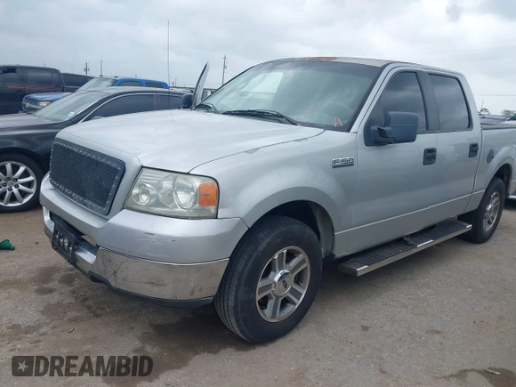 2005 Ford F-150 XLT with VIN 1FTPW12595KD95822, listed as a IAAI auction lot 41939179 with 266,307 mi miles. Bid and sale history available at carsss.com. Image 2.