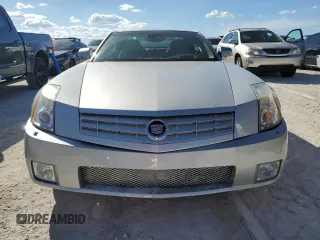 2005 Cadillac XLR z VIN 1G6YV34A455601742, wystawiony jako Copart lot #77878544 z przebiegiem Nie podano mil oraz Szkody całkowita. Historia ofert i sprzedaży dostępna na DreamBid. Obrazek 5.