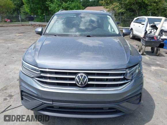 2022 Volkswagen Tiguan SE with VIN 3VV3B7AX9NM089164, listed as a IAAI auction lot 42065583 with 59,270 mi miles and . Bid and sale history available at DreamBid. Image 12.