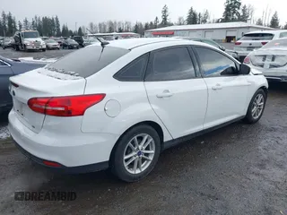 2016 Ford Focus SE with VIN 1FADP3F24GL337504, listed as a IAAI auction lot 41429358 with 91,458 mi miles and . Bid and sale history available at DreamBid. Image 4.