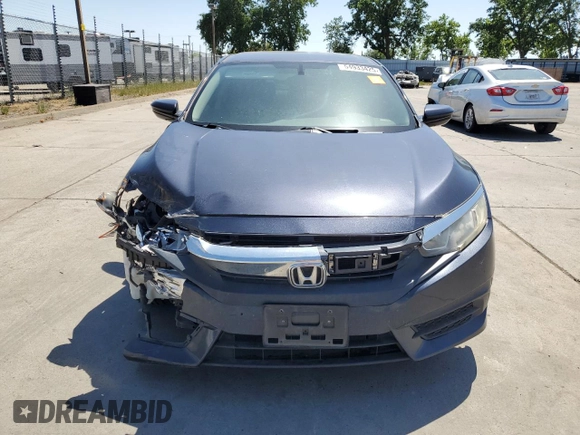 2017 Honda Civic LX z VIN 2HGFC2F55HH523474, wystawiony jako Copart lot #54933425 z przebiegiem 133 036 mil mil oraz Szkoda całkowita • Salvage title. Historia ofert i sprzedaży dostępna na DreamBid. Obrazek 5.
