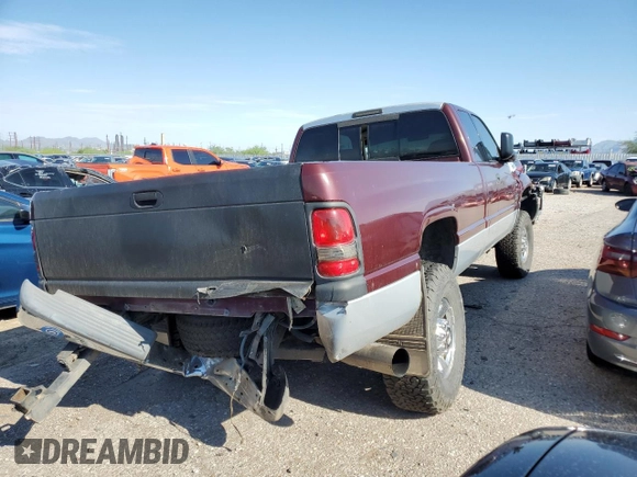 2001 Dodge Ram 2500 with VIN 1B7KF23661J228390, listed as a Copart auction lot 65231164 with 193,455 mi miles and Salvage Title. Bid and sale history available at carsss.com. Image 3.