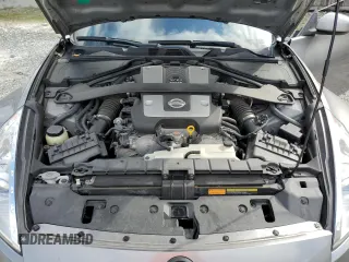 2009 Nissan 370Z z VIN JN1AZ44E69M405389, wystawiony jako Copart lot #43340975 z przebiegiem 31 521 mil mil oraz Szkoda całkowita • Salvage title. Historia ofert i sprzedaży dostępna na DreamBid. Obrazek 12.