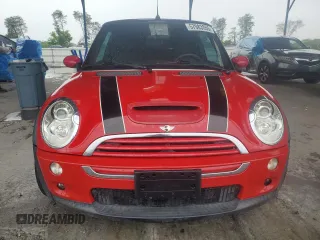 2005 MINI Convertible S с VIN WMWRH334X5TF82551, выставлен на аукционе Copart как лот 57983355 с пробегом 73 885 миль миль и Списание • Salvage title. История ставок и продаж доступна на DreamBid. Изображение 5.