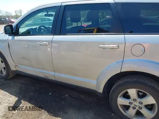 2011 Dodge Journey Mainstreet with VIN 3D4PH1FG4BT562414, listed as a IAAI auction lot 42122747 with 132,488 mi miles and . Bid and sale history available at DreamBid. Image 13.
