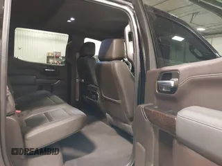 2020 GMC Sierra 1500 Denali with VIN 1GTU9FEL8LZ176453, listed as a IAAI auction lot 42194497 with 64,932 mi miles and . Bid and sale history available at DreamBid. Image 8.