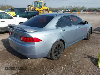 2004 Acura TSX with VIN JH4CL96844C030143, listed as a IAAI auction lot 42035820 with 216,588 mi miles. Bid and sale history available at carsss.com. Image 4.