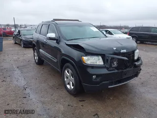 2013 Jeep Grand Cherokee Limited with VIN 1C4RJFBG4DC633137, listed as a IAAI auction lot 41235064 with 163,820 mi miles. Bid and sale history available at carsss.com. Image 1.