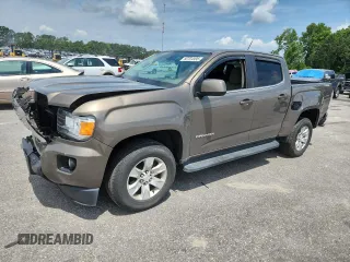 2016 GMC Canyon 2WD SLE with VIN 1GTG5CE38G1169708, listed as a Copart auction lot 60704995 with 96,674 mi miles and Salvage title. Bid and sale history available at DreamBid. Image 1.