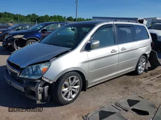2005 Honda Odyssey EX z VIN 5FNRL38465B411189, wystawiony jako IAAI lot #42310199 z przebiegiem 304 142 mil mil oraz . Historia ofert i sprzedaży dostępna na DreamBid. Obrazek 17.