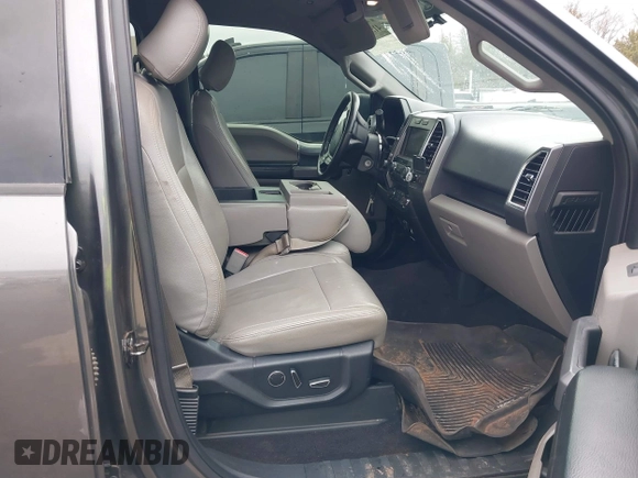 2015 Ford F-150 XLT with VIN 1FTEW1EG8FKE38679, listed as a IAAI auction lot 41526976 with 137,000 mi miles. Bid and sale history available at carsss.com. Image 5.