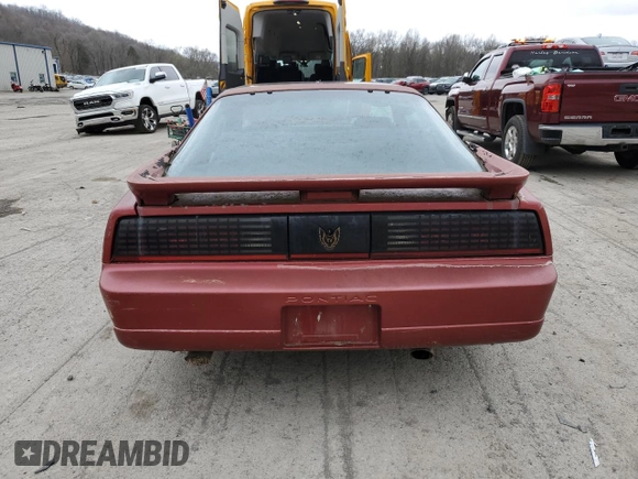 1989 Pontiac Firebird z VIN 1G2FW2181KL244335, wystawiony jako Copart lot #51469365 z przebiegiem 150 615 mil mil oraz Czysty tytuł • Clean title. Historia ofert i sprzedaży dostępna na DreamBid. Obrazek 6.