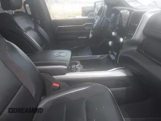 2023 Ram 1500 Laramie with VIN 1C6SRFJT3PN541901, listed as a IAAI auction lot 42156766 with 58,082 mi miles and . Bid and sale history available at DreamBid. Image 5.