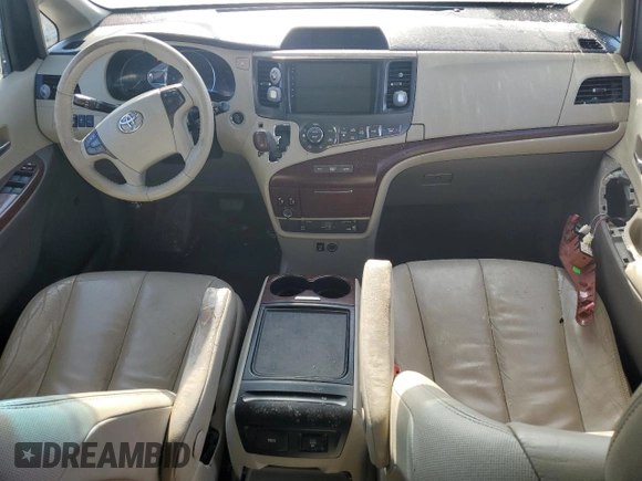 2012 Toyota Sienna XLE AAS with VIN 5TDYK3DC2CS243832, listed as a Copart auction lot 46677115 with 253,252 mi miles and Salvage Title. Bid and sale history available at DreamBid. Image 8.