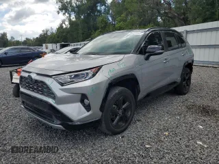 2021 Toyota RAV4 Hybrid XSE with VIN 2T3E6RFVXMW020561, listed as a Copart auction lot 64822005 with 39,434 mi miles and Salvage title. Bid and sale history available at DreamBid. Image 1.