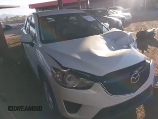 2014 Mazda CX-5 Sport with VIN JM3KE2BE9E0389153, listed as a IAAI auction lot 42152948 with 232,547 mi miles and . Bid and sale history available at DreamBid. Image 1.
