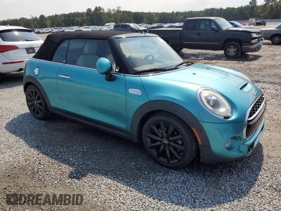 2018 MINI Convertible Cooper S with VIN WMWWG9C59J3C82446, listed as a Copart auction lot 72790934 with 56,875 mi miles and Salvage Title. Bid and sale history available at carsss.com. Image 4.