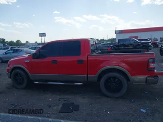 2005 Ford F-150 XLT with VIN 1FTPW12585KE04249, listed as a IAAI auction lot 41983950 with 212,289 mi miles. Bid and sale history available at carsss.com. Image 14.
