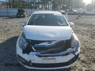 2014 Kia Rio EX z VIN KNADN4A39E6375275, wystawiony jako Copart lot #47278305 z przebiegiem 101 571 mil mil oraz Szkoda całkowita • Salvage title. Historia ofert i sprzedaży dostępna na DreamBid. Obrazek 5.