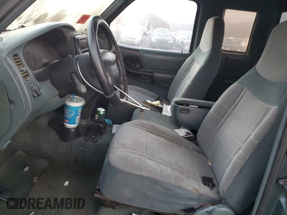 1997 Ford Ranger XL z VIN 1FTCR14A2VPA73865, wystawiony jako Copart lot #87299264 z przebiegiem 201 191 mil mil oraz Szkoda całkowita • Salvage title. Historia ofert i sprzedaży dostępna na DreamBid. Obrazek 7.
