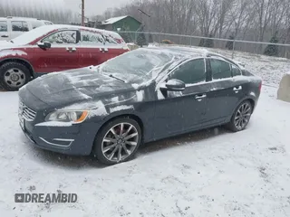 2015 Volvo S60 T5 Premier with VIN YV1612TK6F1348608, listed as a IAAI auction lot 41229153 with 73,019 mi miles. Bid and sale history available at carsss.com. Image 2.