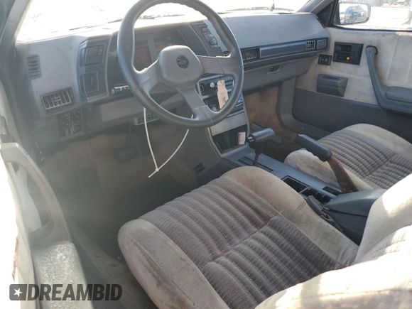 1989 Chevrolet Cavalier with VIN 1G1JF31W1K7190840, listed as a Copart auction lot 77747934 with Not Provided miles and Salvage Title. Bid and sale history available at DreamBid. Image 8.