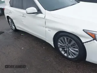 2019 Infiniti Q50 Signature Edition with VIN JN1EV7AP9KM514861, listed as a IAAI auction lot 41805236 with 58,286 mi miles and . Bid and sale history available at carsss.com. Image 6.