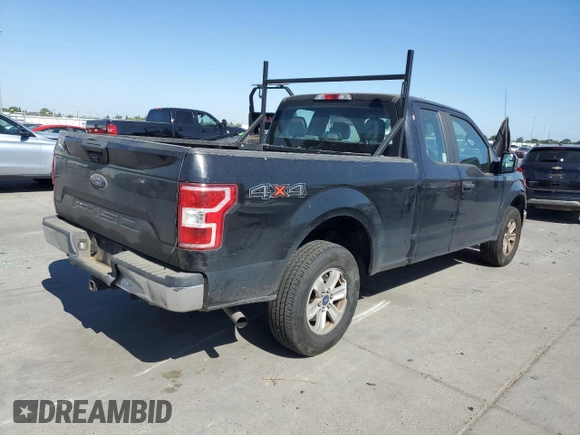 2018 Ford F-150 XL with VIN 1FTEX1EB2JKF61257, listed as a Copart auction lot 53674615 with 161,021 mi miles and Salvage title. Bid and sale history available at DreamBid. Image 3.