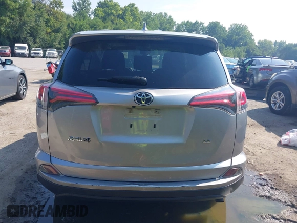 2018 Toyota RAV4 LE with VIN JTMZFREV3JJ161811, listed as a IAAI auction lot 40131640 with 114,330 mi miles. Bid and sale history available at carsss.com. Image 16.