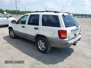 2003 Jeep Grand Cherokee Laredo with VIN 1J4GW48S73C605561, listed as a IAAI auction lot 42424407 with Not provided miles and . Bid and sale history available at DreamBid. Image 3.