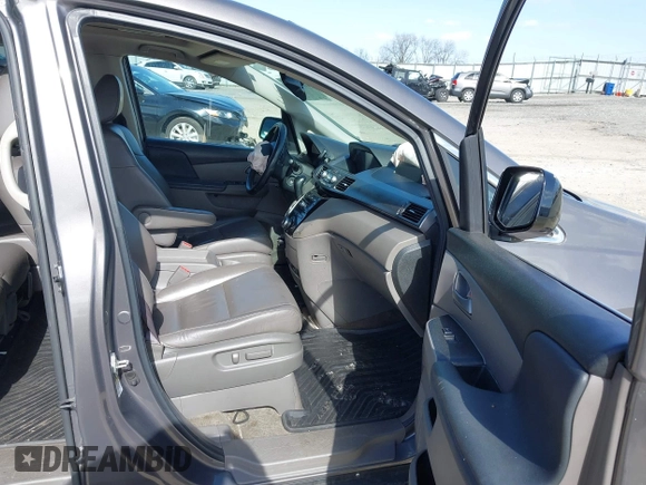 2013 Honda Odyssey EX-L with VIN 5FNRL5H62DB035649, listed as a IAAI auction lot 41849123 with 176,392 mi miles and . Bid and sale history available at carsss.com. Image 5.