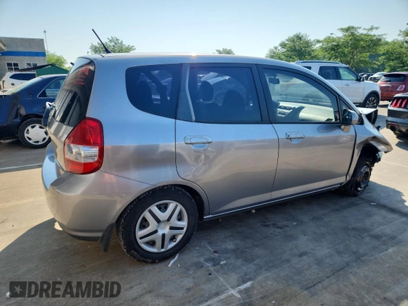 2007 Honda Fit with VIN JHMGD38407S066833, listed as a Copart auction lot 61713125 with 62,917 mi miles and Salvage title. Bid and sale history available at DreamBid. Image 3.