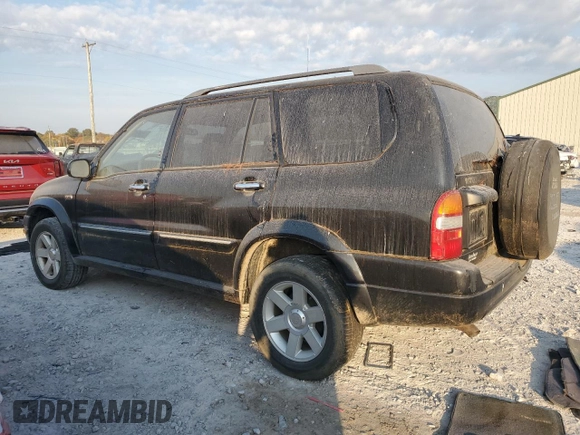 2001 Suzuki XL7 Standard z VIN JS3TX92V514102993, wystawiony jako Copart lot #76669614 z przebiegiem 65 789 mil mil oraz Szkoda całkowita • Salvage title. Historia ofert i sprzedaży dostępna na DreamBid. Obrazek 2.