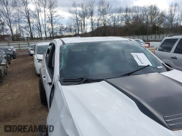 2018 Chevrolet Colorado 4WD ZR2 with VIN 1GCGTEEN3J1295176, listed as a IAAI auction lot 41418943 with 57,621 mi miles. Bid and sale history available at carsss.com. Image 6.