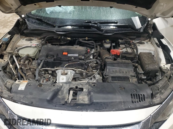 2017 Honda Civic LX z VIN 19XFC2F55HE073366, wystawiony jako Copart lot #60396325 z przebiegiem 135 910 mil mil oraz Szkoda całkowita • Salvage title. Historia ofert i sprzedaży dostępna na DreamBid. Obrazek 11.