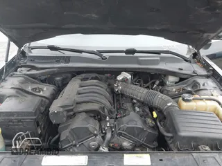 2009 Chrysler 300 LX with VIN 2C3KA43D19H506753, listed as a IAAI auction lot 42053199 with 106,092 mi miles. Bid and sale history available at carsss.com. Image 10.