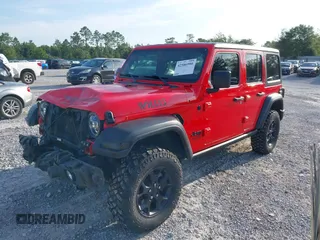 2020 Jeep Wrangler Unlimited Willys z VIN 1C4HJXDM1LW290451, wystawiony jako IAAI lot #42586990 z przebiegiem 64 163 mil mil oraz . Historia ofert i sprzedaży dostępna na DreamBid. Obrazek 2.