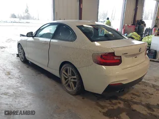2016 BMW 2 Series 228i xDrive with VIN WBA1G9C53GVX97088, listed as a IAAI auction lot 41617710 with 72,978 mi miles. Bid and sale history available at carsss.com. Image 3.
