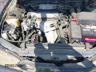 1995 Toyota Camry LE z VIN 4T1SK12E3SU576500, wystawiony jako IAAI lot #42186816 z przebiegiem 216 809 mil mil oraz . Historia ofert i sprzedaży dostępna na DreamBid. Obrazek 10.