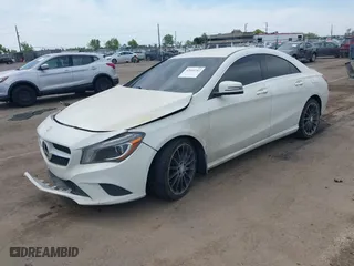 2014 Mercedes-Benz CLA-Class CLA 250 with VIN WDDSJ4GB0EN136231, listed as a IAAI auction lot 42046182 with 94,729 mi miles. Bid and sale history available at carsss.com. Image 2.