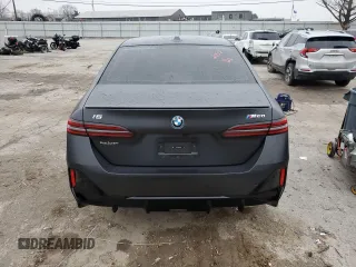 2024 BMW i5 M60 z VIN WBY43FK05RCR32052, wystawiony jako Copart lot #85559624 z przebiegiem 5 913 mil mil oraz Nie do naprawy • Non repairable. Historia ofert i sprzedaży dostępna na DreamBid. Obrazek 6.