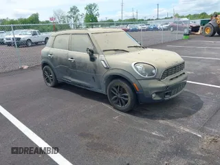2014 MINI Countryman S with VIN WMWZC3C59EWP25041, listed as a IAAI auction lot 42085698 with 109,320 mi miles and . Bid and sale history available at DreamBid. Image 1.